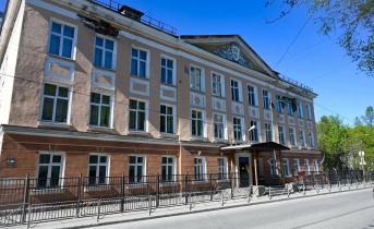 город