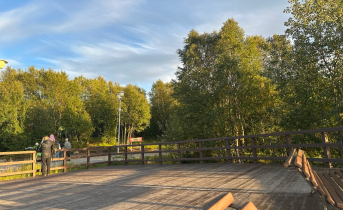 город