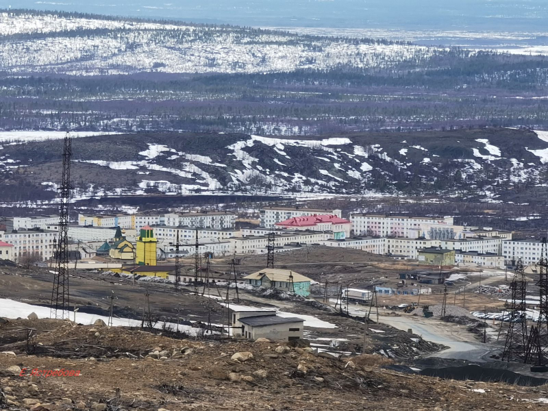 Город