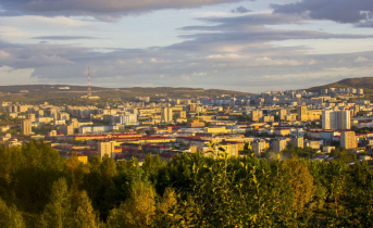 город