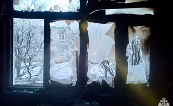 Ребенка эвакуировали из пожара в Мурманске Пожар