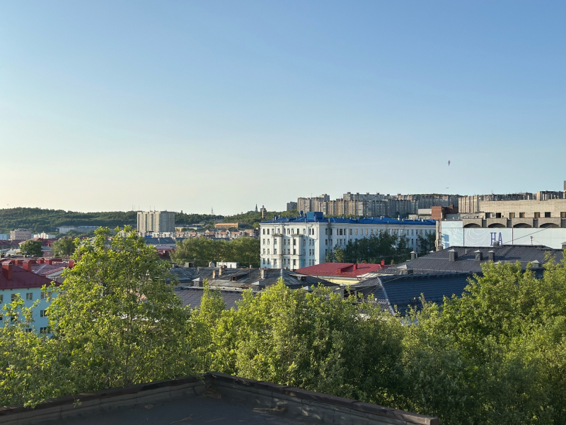 город