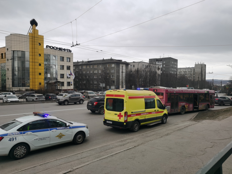 город