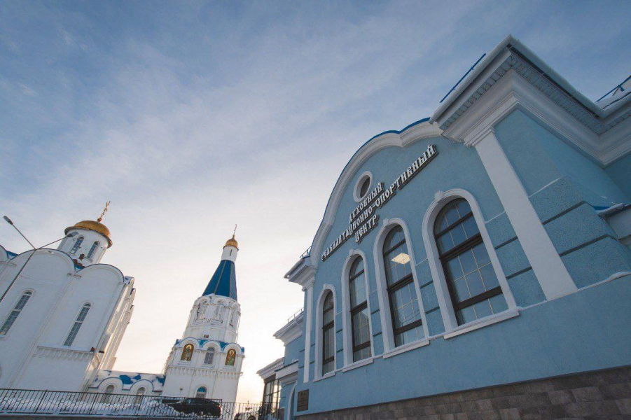 город