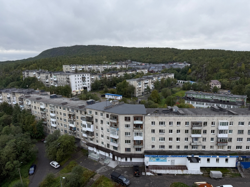 Город