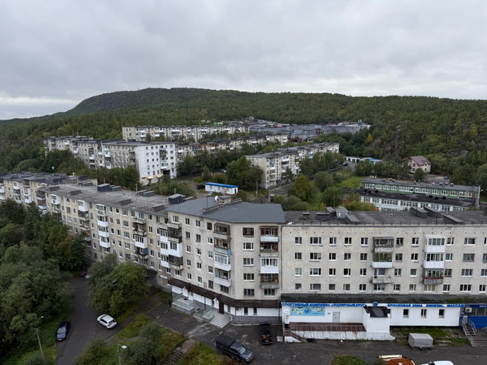 Город