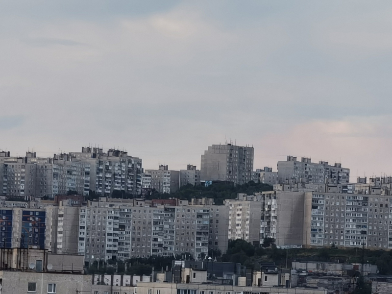 Город