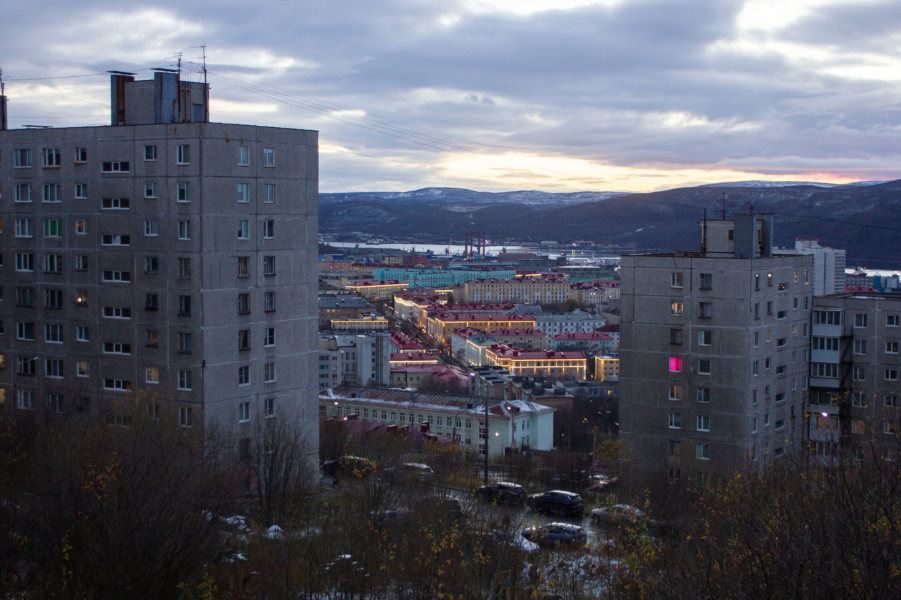 город
