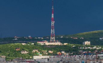 город