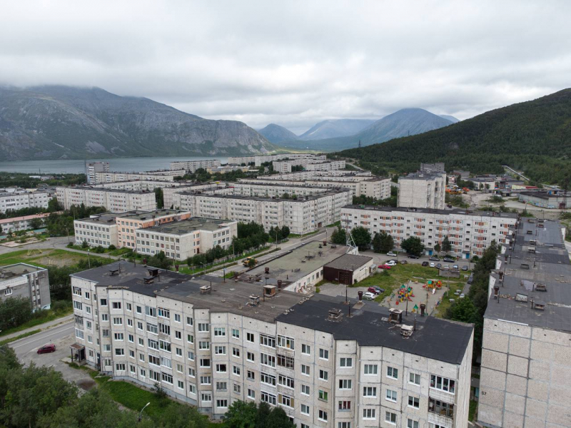 город