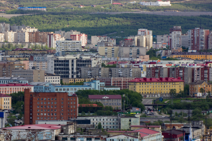 город