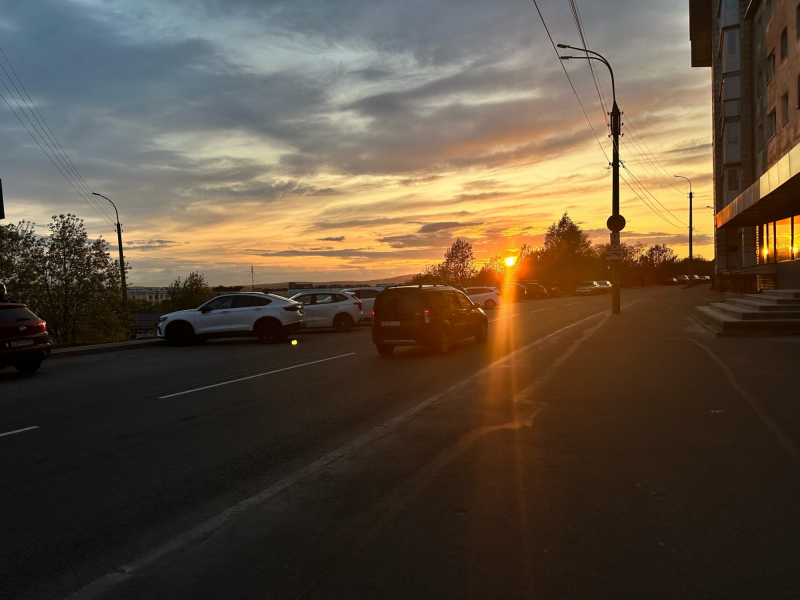 город