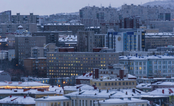 Город